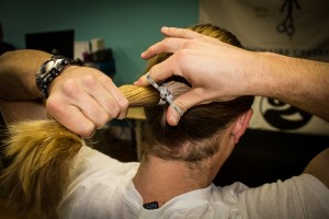 Doing the second wrap on the man tail