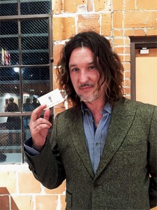 A Happy Longhair With A Card