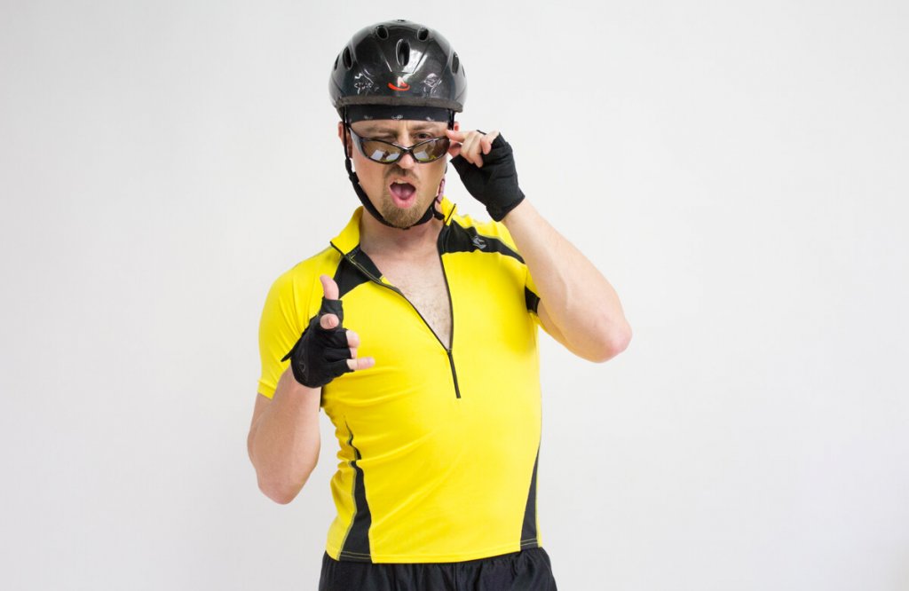 El Rubio with long hair and cycling