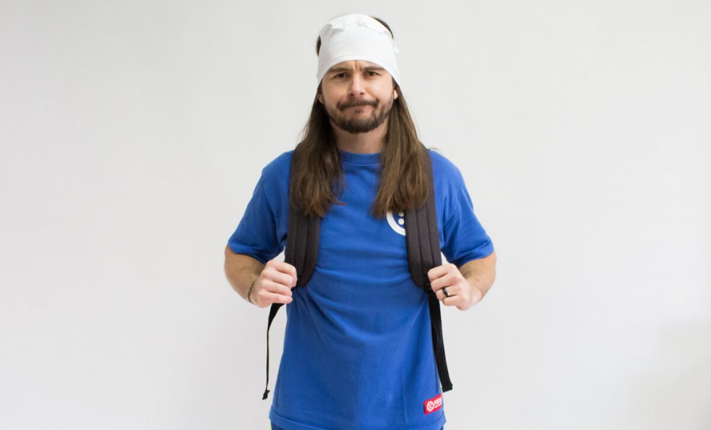 El Rubio hiking with long hair and headwrap