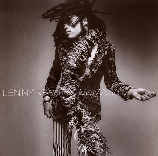Lenny Kravitz's iconic "Mama Said" album cover, black and white photo of Lenny with his long locs flipping through the air, head turned to the left, with sunglasses on, a long feathery scarf, fashionable coat, and striped pantsfeatured in the Best Hair in Rock and Roll.