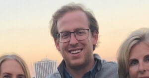 Charlie aka El Chuckerino smiling with his hair noticeably starting to look very thin