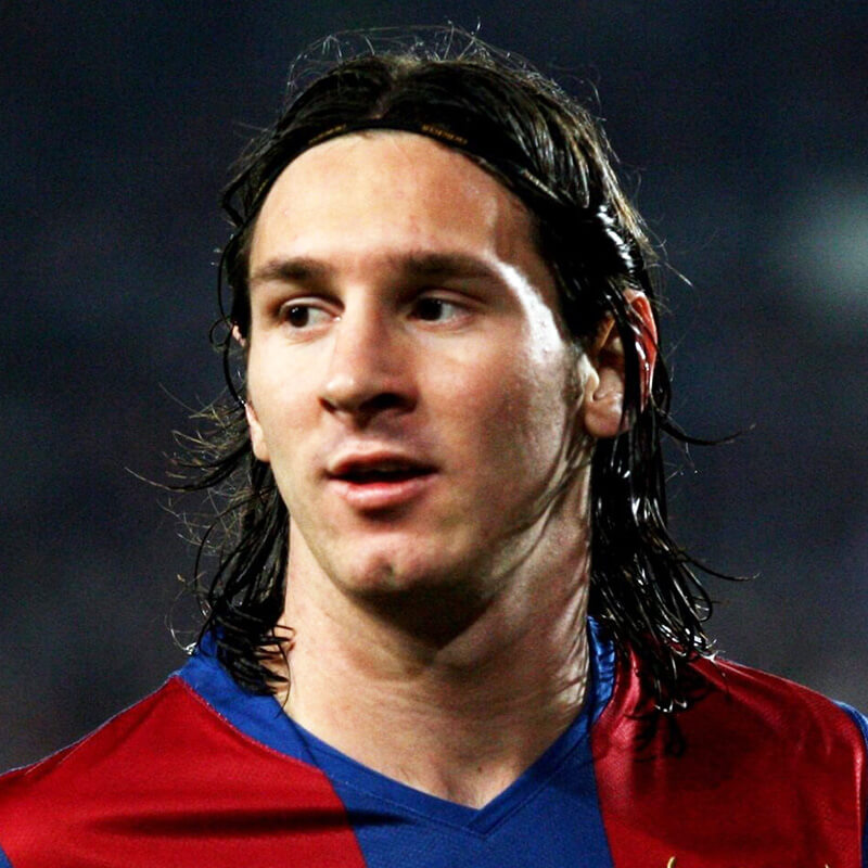 Lionel Messi with long brown hair