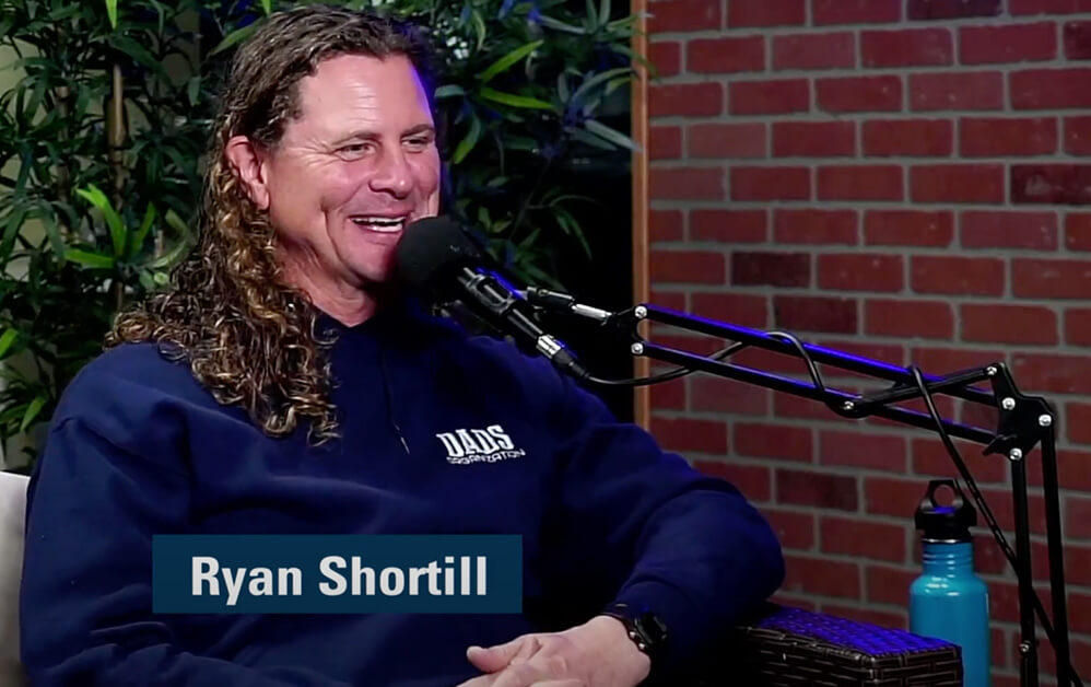 Ryan Shortill smiling while speaking on Let It Ride
