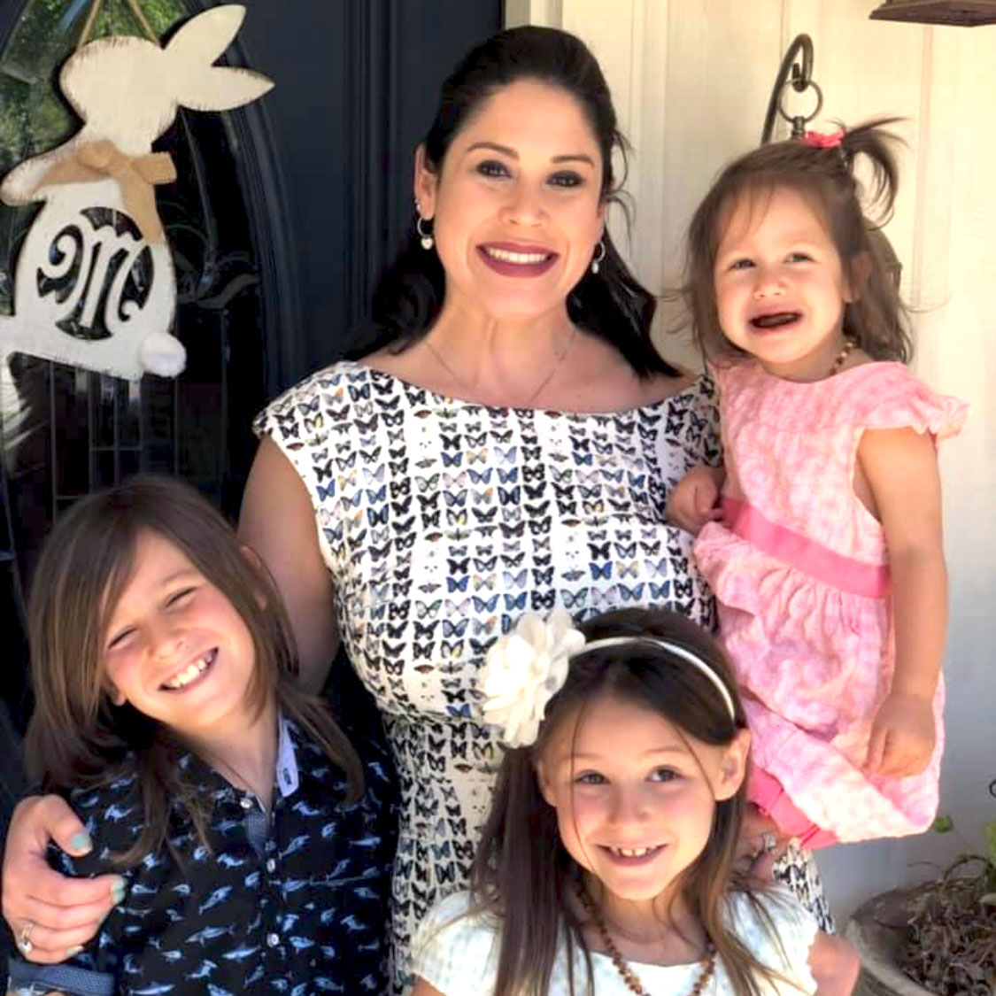 Luke with his family who are dealing with discriminatory grooming codes in texas schools