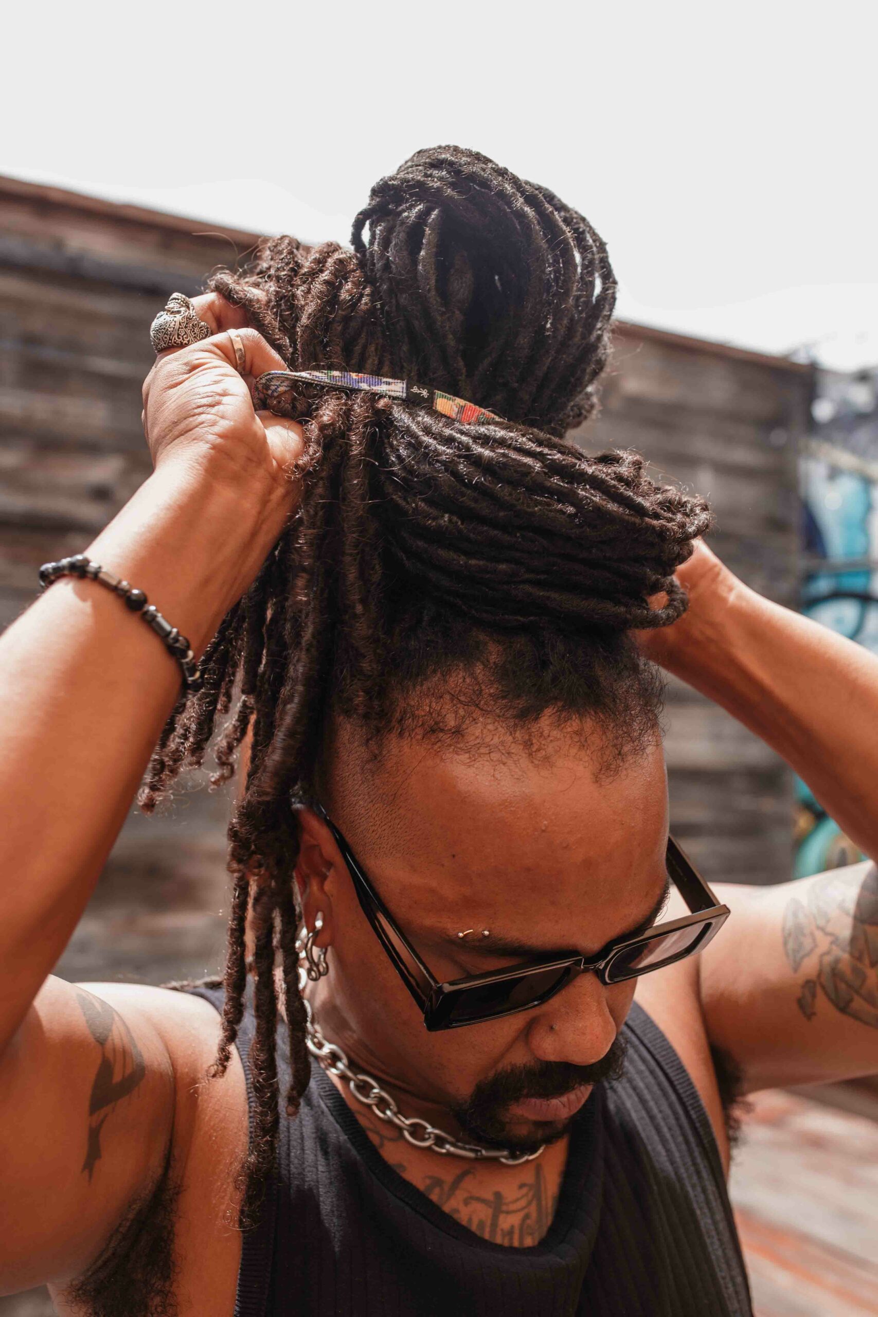 Locas tied up with a longhairs thing headband